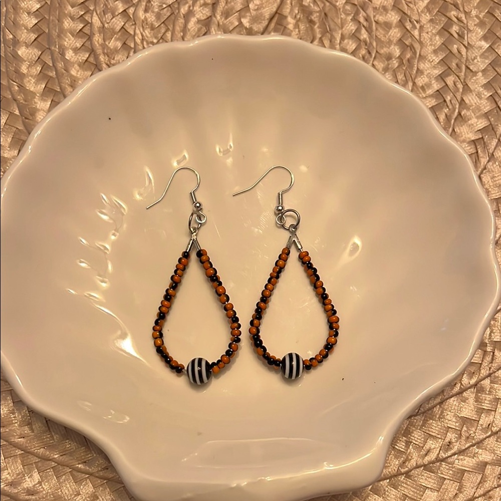 Orange and Black Teardrop Earrings with Textured Design